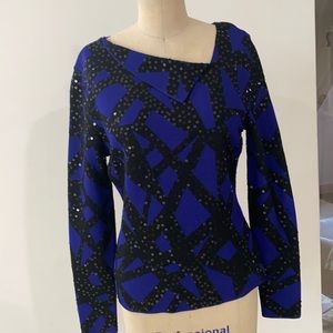 Navy and black blouse, pit to pit: 19, length 23”.